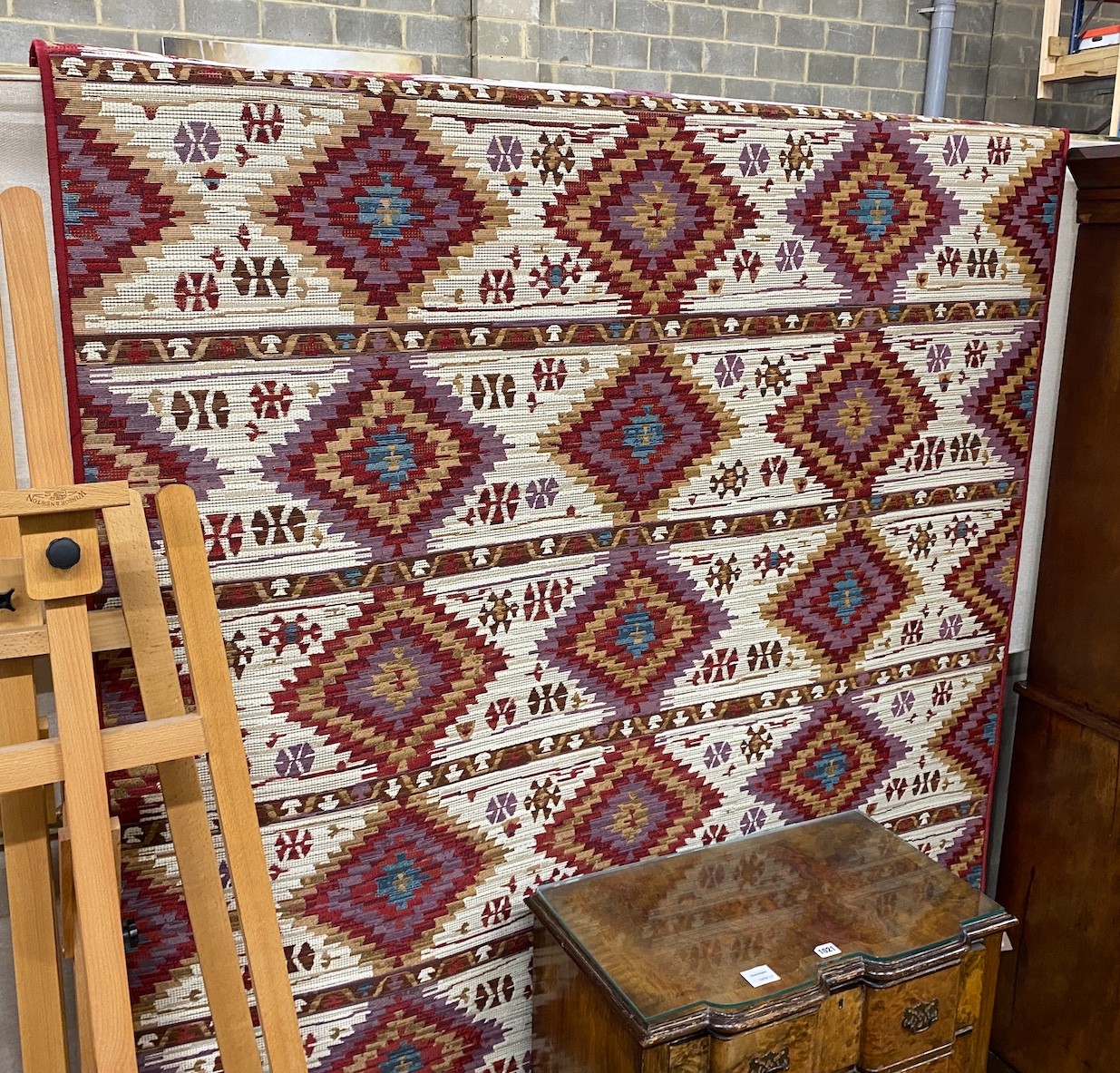 A modern Kilim style polychrome rug, 220cms x 150cms